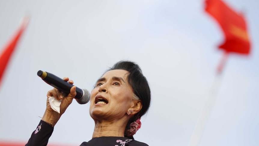 Aung San Suu Kyi speaks during a campaign rally.