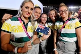 Australian athletes enter the stadium before the start of the Commonwealth Games closing ceremony.