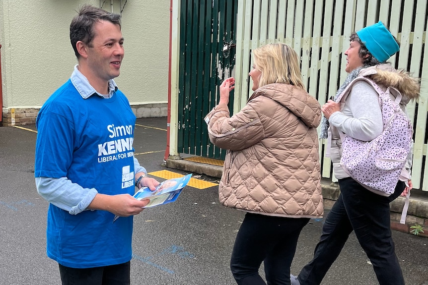 Noel McCoy handing out election material