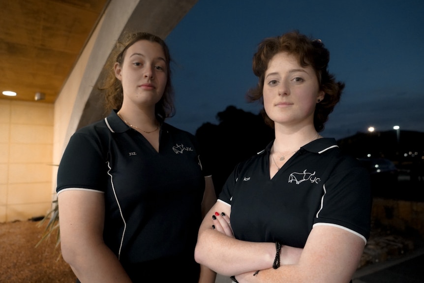 Two young people near council buildings