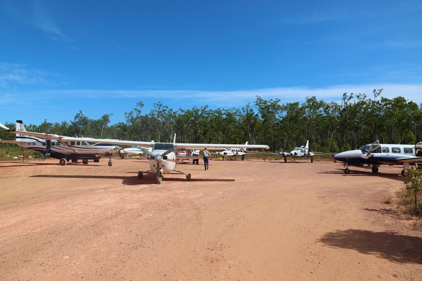 Planes backed up on the outback airstrip near Kabulwarnamyo.
