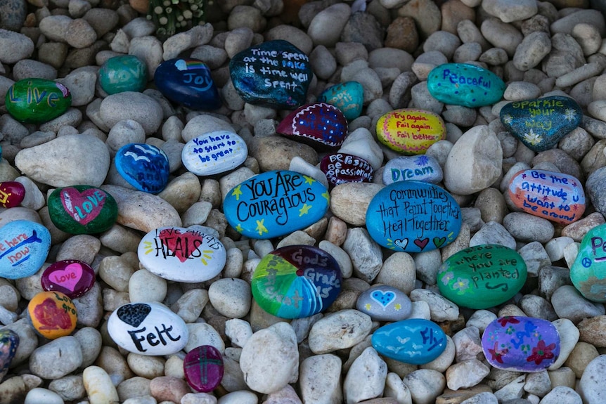 stones at a memorial outside Marjory Stoneman Douglas High School
