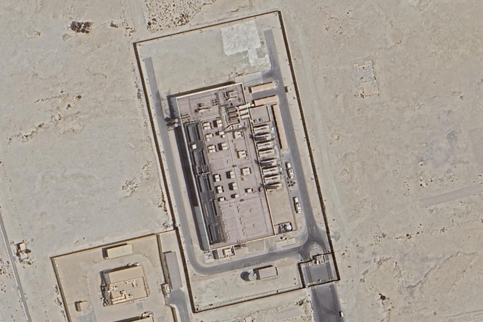 A satellite image of a data center in the desert.