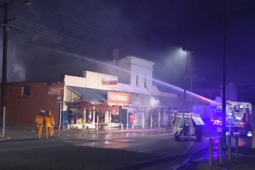 Fire crews battle supermarket fire at Saddleworth.