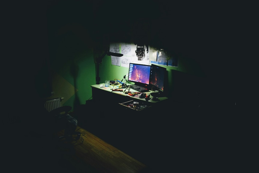 Computer in a dark room