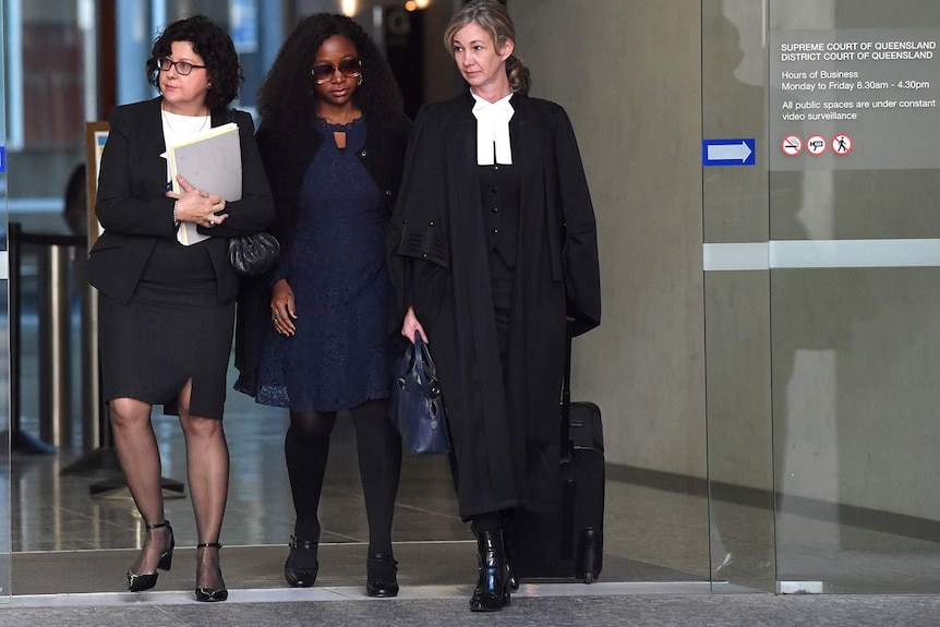 Three women leaving the Supreme Court in Brisbane