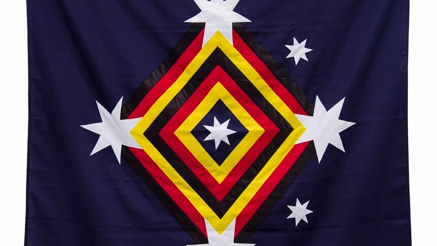 A flag with a navy background, diamond in the centre, and seven stars overlaid.