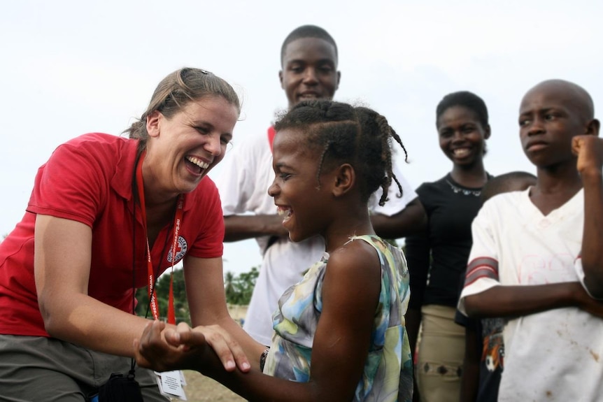 Red Cross worker with Fiji kids