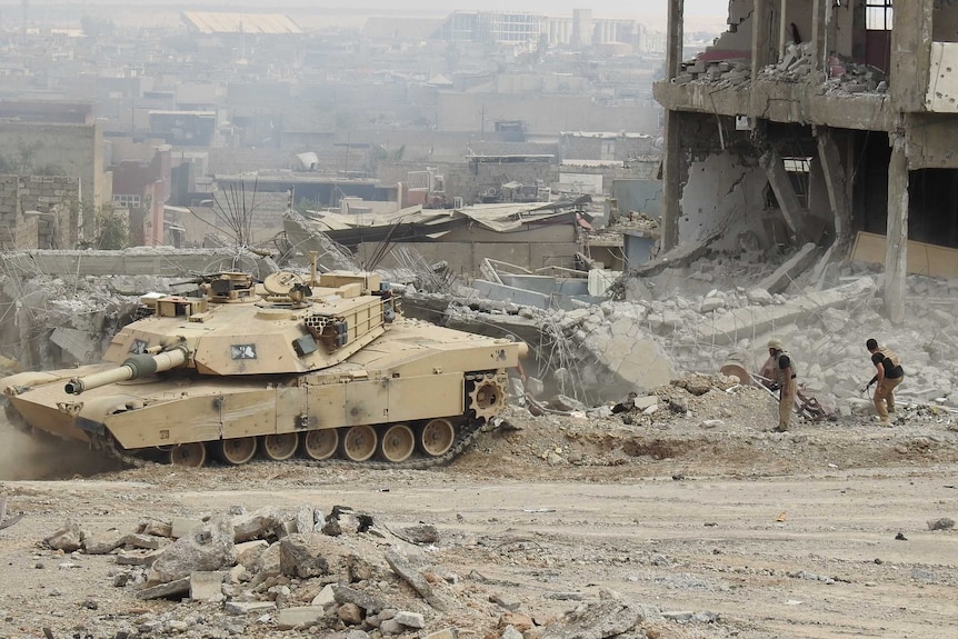 David Eubank trails an Iraqi tank in Mosul