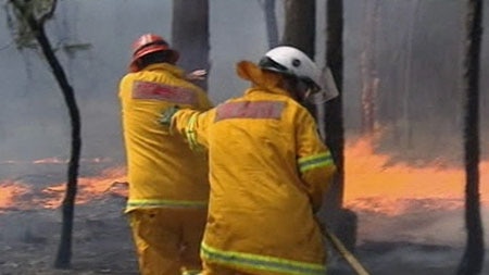 Battle ... bushfires have destroyed six homes in New South Wales.