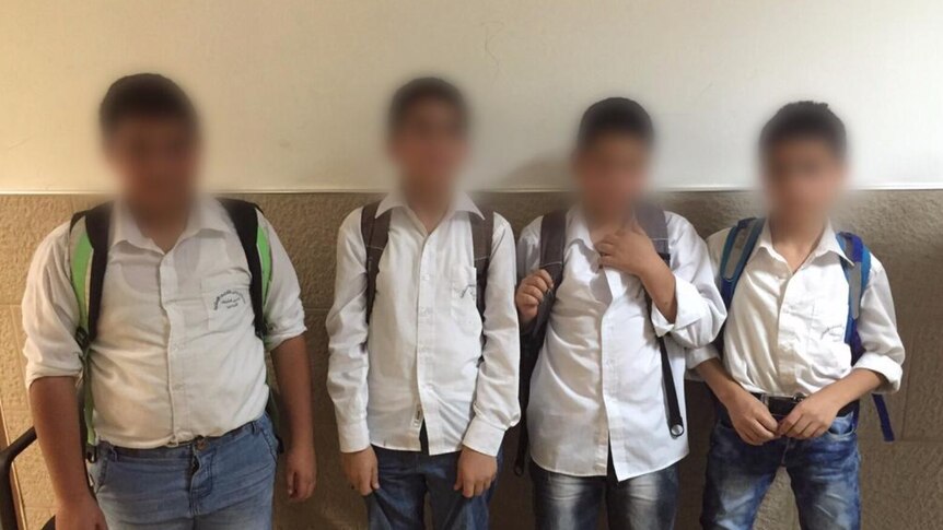 Palestinian boys arrested by Israeli police for stone throwing
