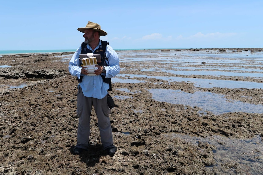 Archaeologist Silvano Jung using a drone at the site of the SS Brisbane shipwreck near Bynoe Harbour.