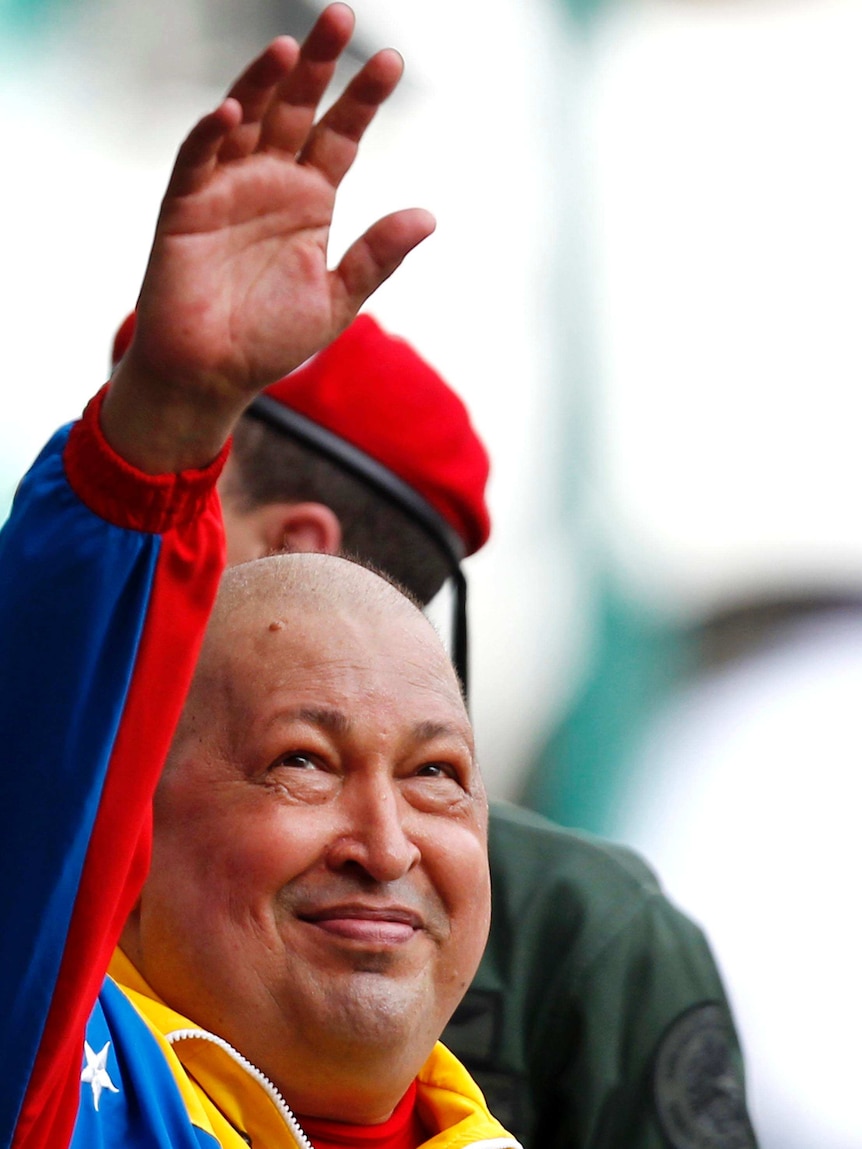 Hugo Chavez waves during a rally in Caracas.