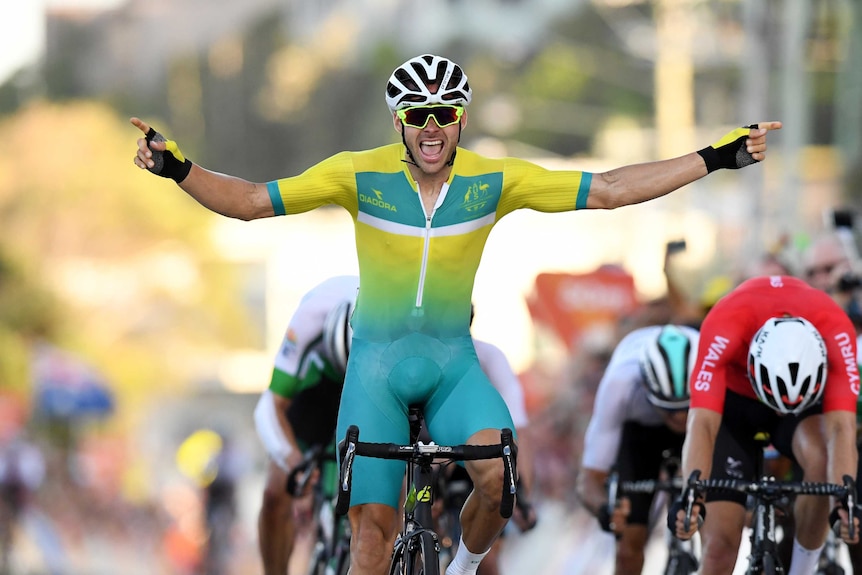 Steele Von Hoff of Australia crosses the finish line to win the men's cycling road race.