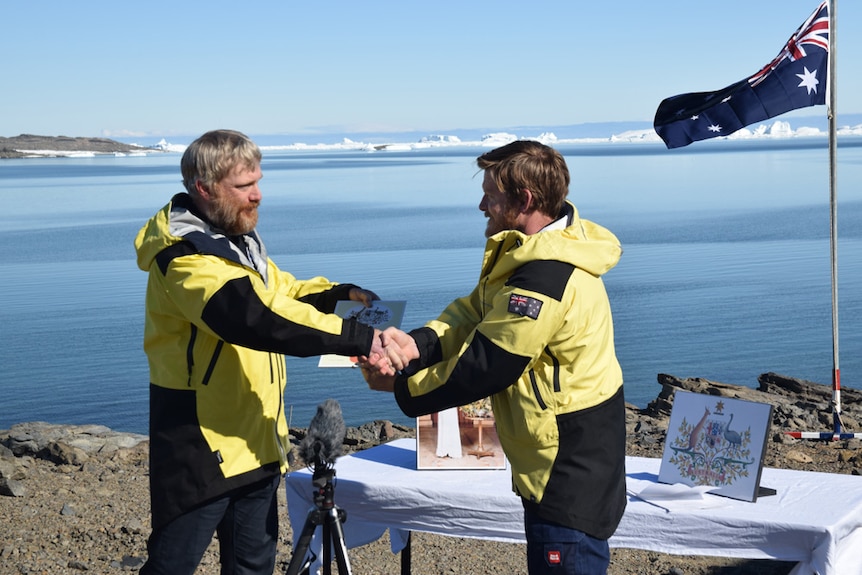 Station Leader Robb Clifton congratulates Terry Barrell