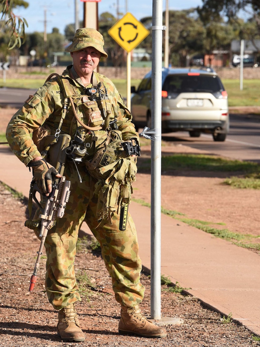 A soldier on guard on the streets of Whyalla