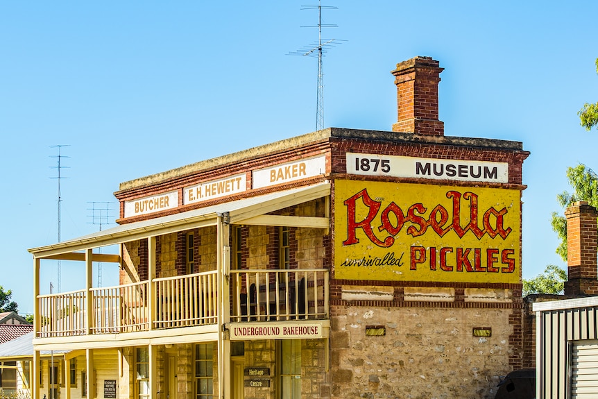 Faded Rosella Pickles sign on the side of an old building