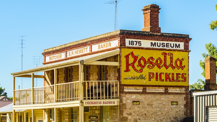 Faded Rosella Pickles sign on the side of an old building