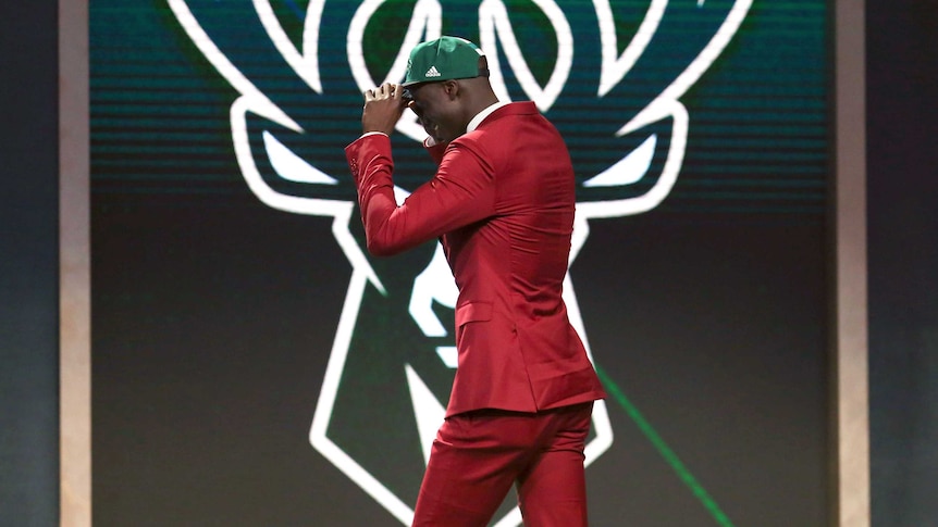 Thon Maker walks on stage at NBA Draft