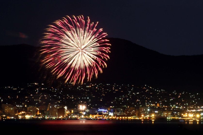 A fireworks burst explodes over Hobart during New Year's Eve celebrations