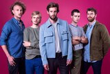 A 2017 press shot of The Rubens against a pink background