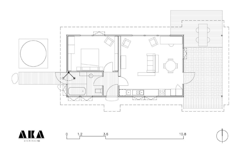 A floorplan showing a bedroom, living room, bathroom and large outdoor area