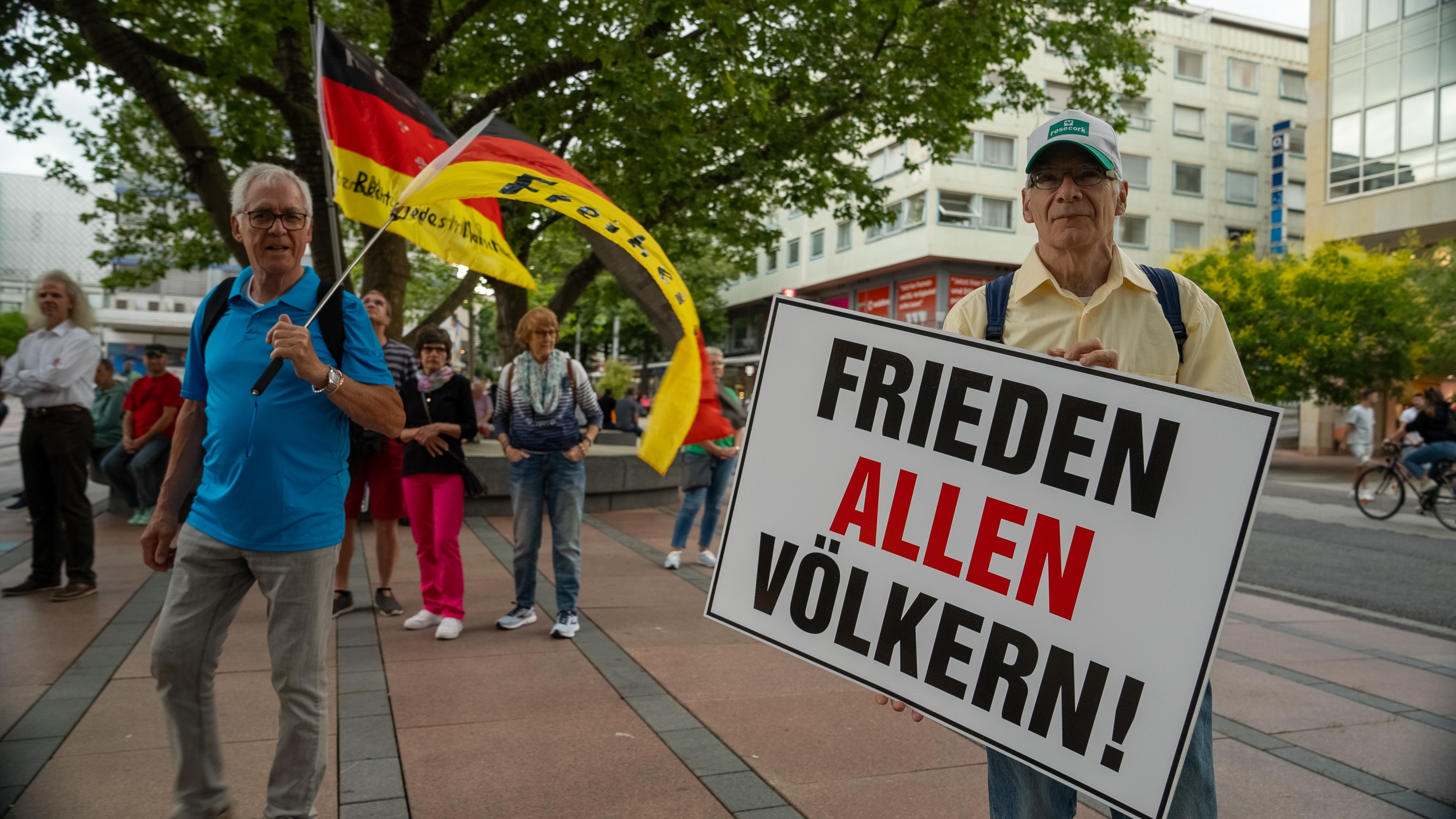 A man holding a sign.