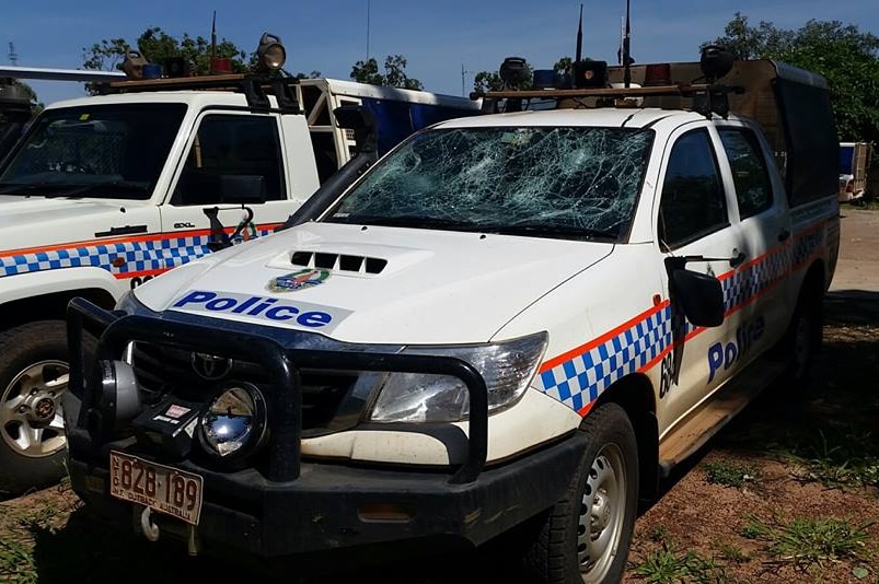 A NT Police car with smashed windscreen.