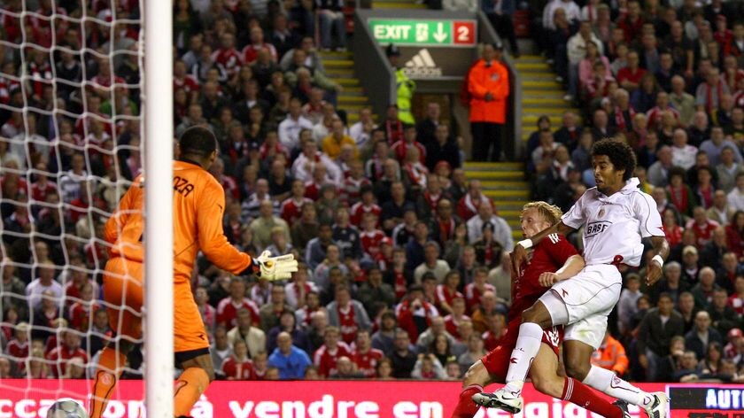 Liverpool's Dirk Kuyt scores the winning goal during their UEFA Champions League qualifier