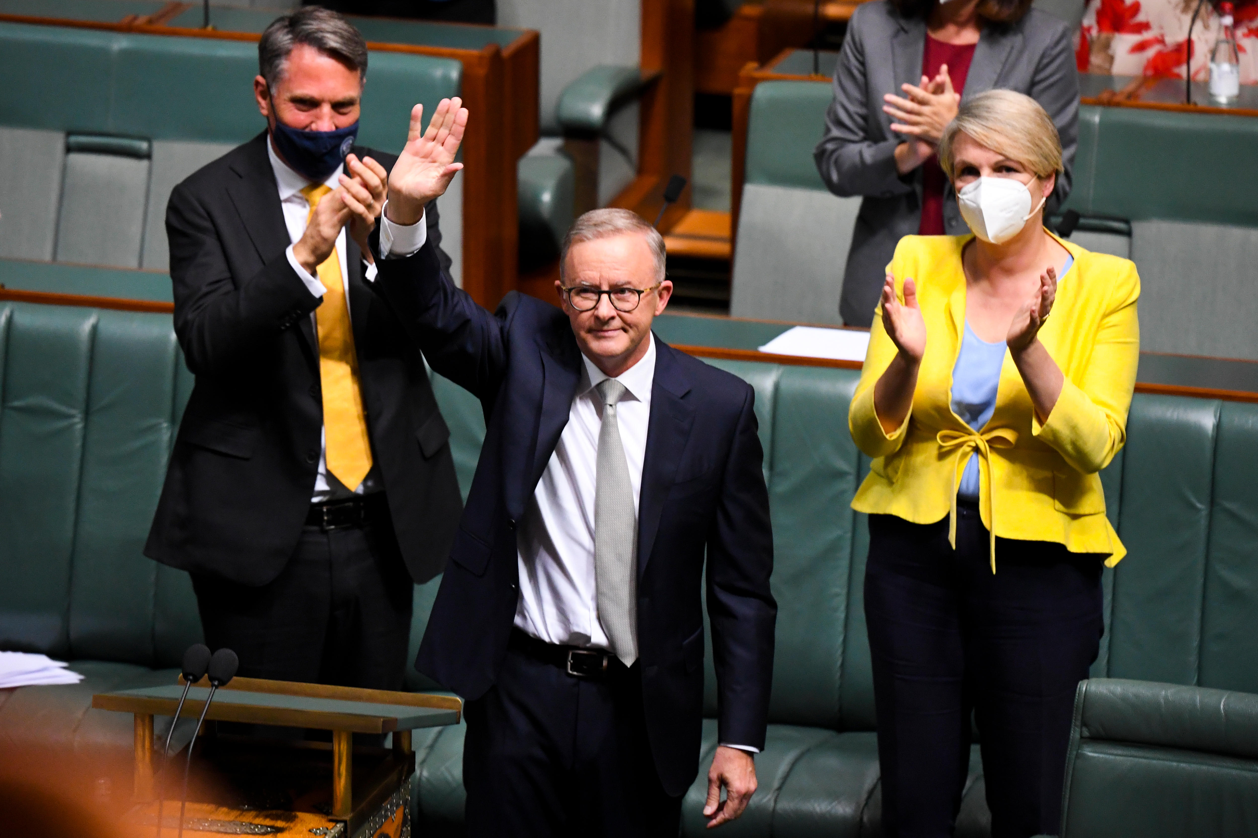 Anthony waves to those sitting across Pariament from where he gives his Budget Reply speech.