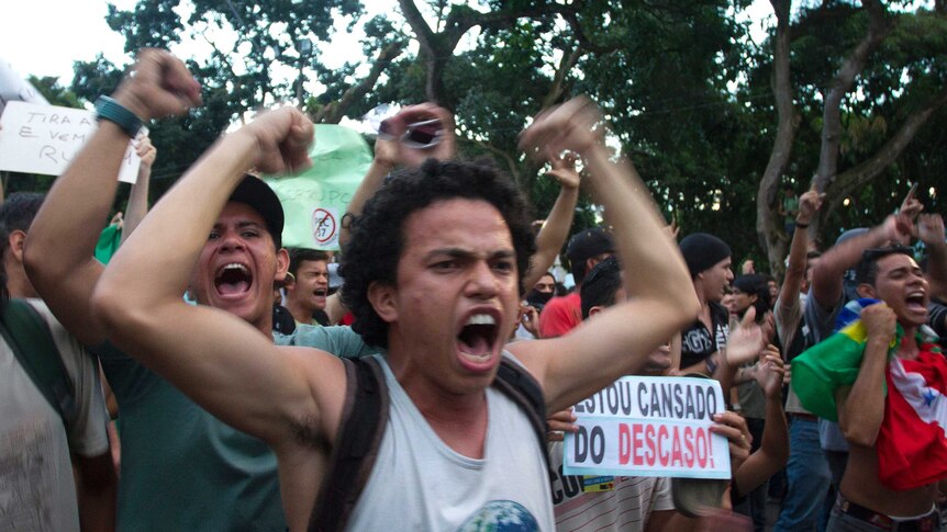 Demonstrators participate in one of many protests around Brazil's major cities in Belem, at the mouth of the Amazon River.