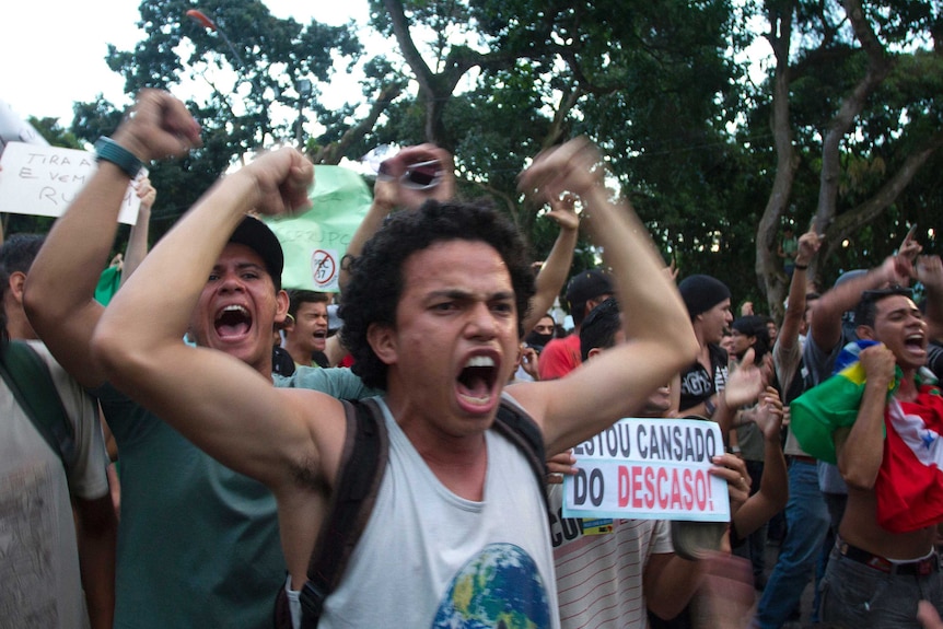 Demonstrators participate in one of many protests around Brazil's major cities in Belem, at the mouth of the Amazon River.