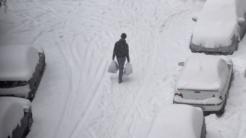 A man walks through heavy snow in Kiev, Ukraine.