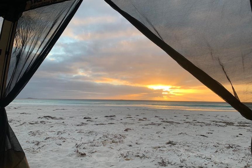 Looking out of a beach shelter at sunrise at Cape Arid