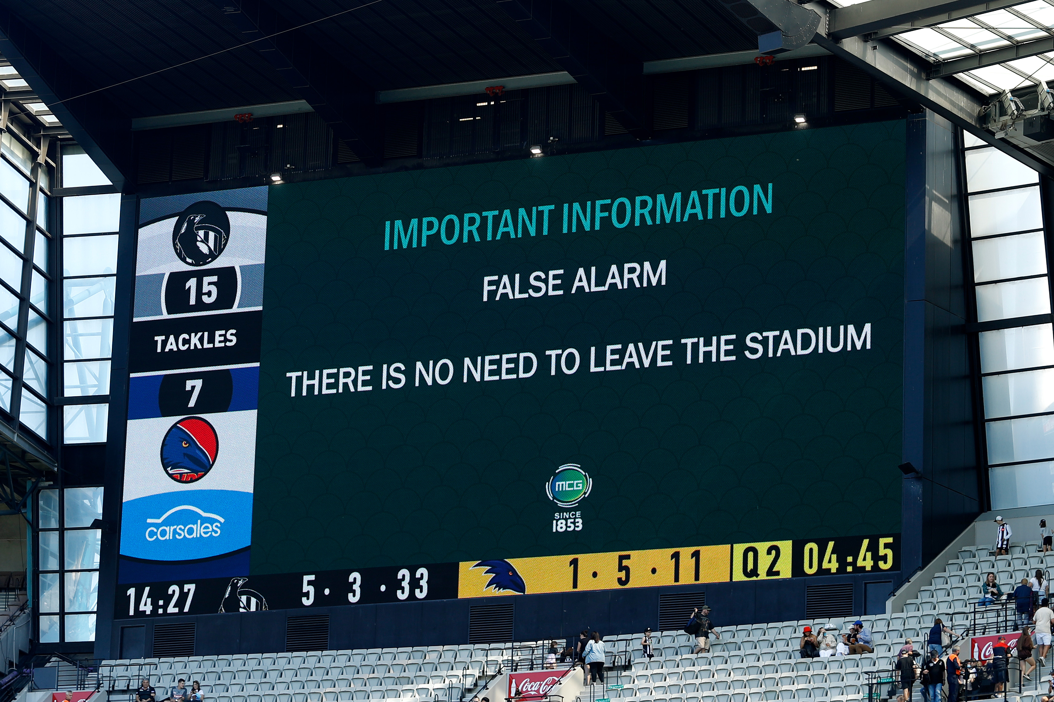 A false alarm message is displayed on the big screen at the MCG.