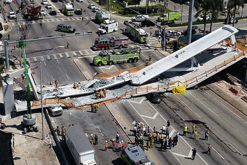 This photo provided by DroneBase shows the collapsed pedestrian bridge at Florida International University in the Miami area.