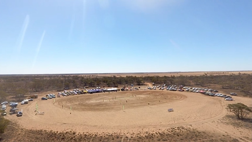 Dirt oval and blue sky