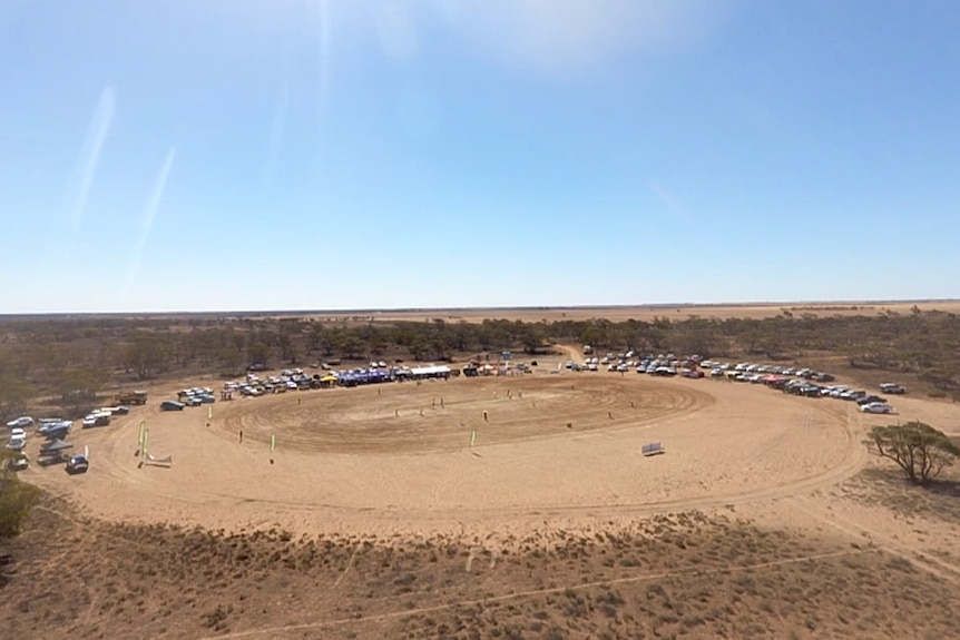 Dirt oval and blue sky