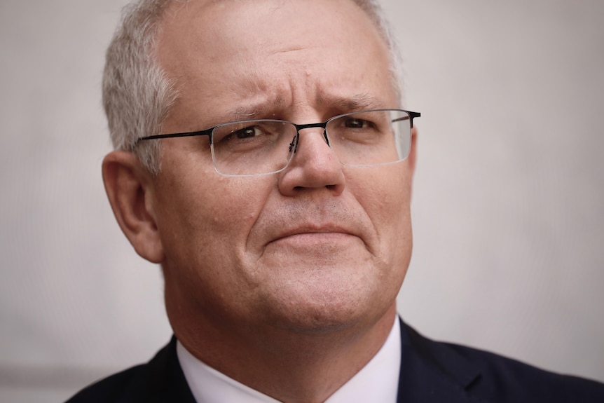 A close up of Prime Minister Scott Morrison, who looks concerned.