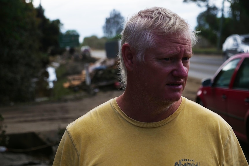 man in yellow shirt