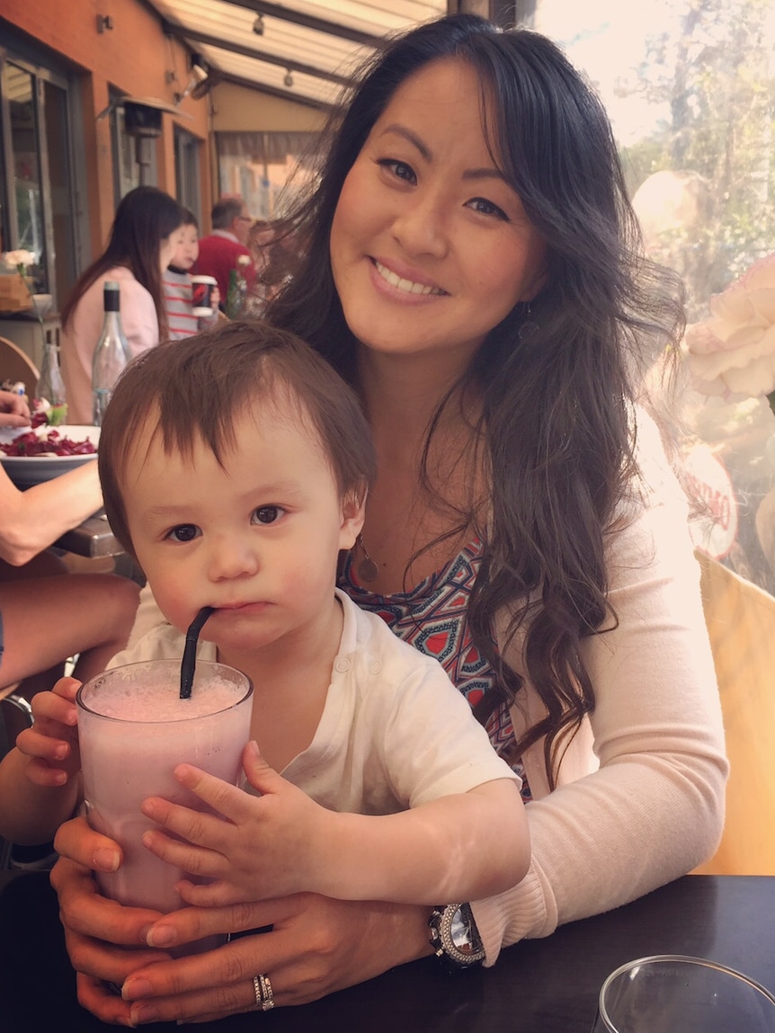 Amanda Palm, from Sydney, and her baby at a cafe.