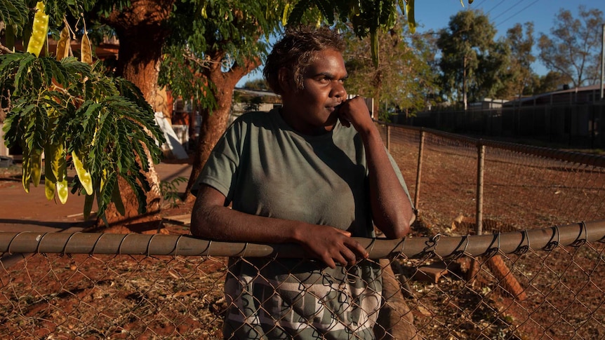 Aboriginal teenager Letisha West watches the sun go down in Warburton, WA.