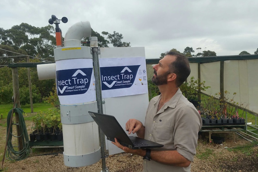 SARDI Senior Research Scientist Dr Rohan Kimber with the Insect Suction Trap