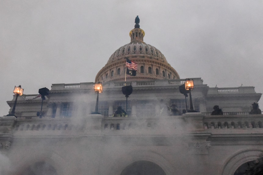 Smoke billowing from the US Capitol building 