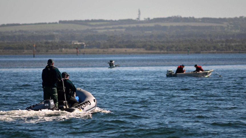 Fisheries officers patrol waters near Swan Bay, part of the Port Phillip Heads Marine National Park.