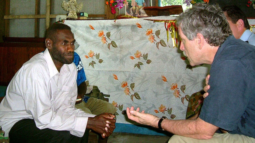 Solomon Islands warlord Harold Keke talks to Nick Warner in 2003.