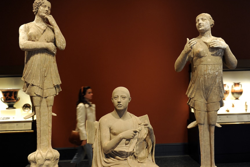 This photo shows a group of three nearly life-size statues known as Orpheus and the Sirens