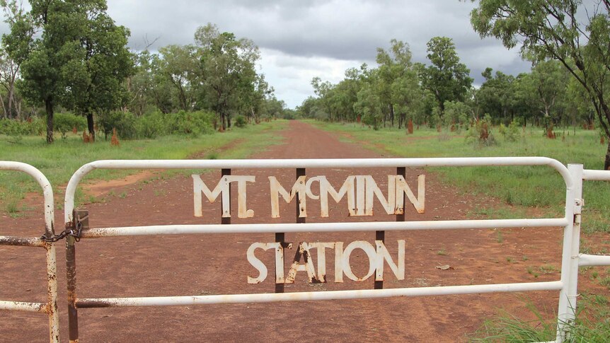 a gate with Mt McMinn Station written on it.