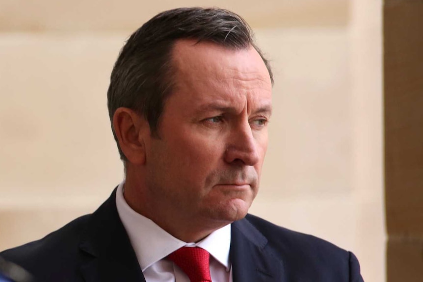 WA Premier Mark McGowan stares into the distance outside parliament in West Perth