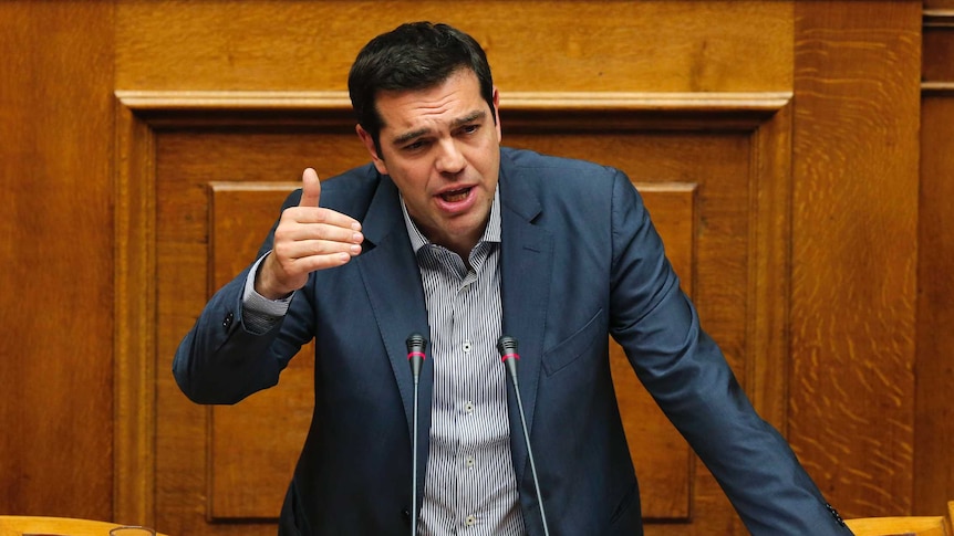 Alexis Tsipras speaks in front of parliament